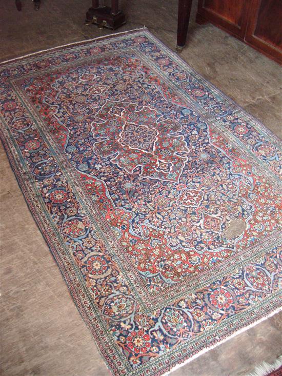 Tabriz rug (holed)
